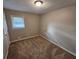 Simple bedroom with window and neutral color scheme at 2314 Emerald Springs Dr, Decatur, GA 30035