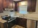 Modern kitchen with stainless steel appliances and granite counters at 2314 Emerald Springs Dr, Decatur, GA 30035