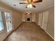 Spacious living room featuring a fireplace and built-in shelving at 2314 Emerald Springs Dr, Decatur, GA 30035
