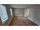 Bright living room with neutral carpeting and large windows at 2314 Emerald Springs Dr, Decatur, GA 30035