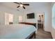 Spacious main bedroom with walk-in closet and TV at 825 Angora Aly, Scottdale, GA 30079