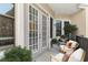 Private patio with comfortable seating and potted plants at 3621 Vinings Slope Se # 1331, Atlanta, GA 30339