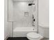 Clean bathroom with a shower/tub combo and black accents at 1129 Victory Sw Dr, Atlanta, GA 30310