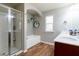 Bathroom boasts a large soaking tub and walk-in shower at 92 Grampian Ct # 14, Marietta, GA 30008