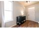 Bright entryway with hardwood floors, and a black console table at 92 Grampian Ct # 14, Marietta, GA 30008