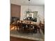 Elegant dining room featuring a large table and brick fireplace at 25 Johnson Rd, Atlanta, GA 30318