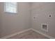 Laundry room with vinyl flooring and shelving at 509 Ajo Way, Dallas, GA 30157