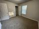 Spacious bedroom with neutral walls and carpet at 309 Hemphill School Nw Rd, Atlanta, GA 30331