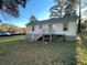 Cute house with a deck and backyard at 309 Hemphill School Nw Rd, Atlanta, GA 30331