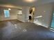 Open concept living room and kitchen with new flooring at 309 Hemphill School Nw Rd, Atlanta, GA 30331