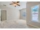 Large bedroom with ceiling fan and multiple windows at 1510 Dolcetto Nw Trce, Kennesaw, GA 30152