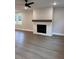 Living room with fireplace and wood-look floors at 2722 Byess Ct, Marietta, GA 30064