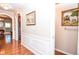 Elegant entryway with hardwood floors and coat closet at 6161 Thorncrest Dr, Tucker, GA 30084