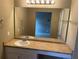 Bathroom vanity with a large mirror and a single sink at 800 Crestside Ct # 800, Austell, GA 30168