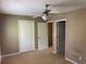 Spacious bedroom with two closets and ceiling fan at 800 Crestside Ct # 800, Austell, GA 30168