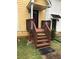 Charming house with a small porch and steps leading to the entrance at 800 Crestside Ct # 800, Austell, GA 30168