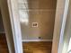 Small laundry closet with wood floors and shelving at 800 Crestside Ct # 800, Austell, GA 30168