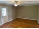Living room with hardwood floors and door to deck at 800 Crestside Ct # 800, Austell, GA 30168