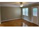 Living room with hardwood floors and door to deck at 800 Crestside Ct # 800, Austell, GA 30168