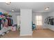 Spacious walk-in closet with ample shelving and hanging space at 4580 Cloister Cir, Hampton, GA 30228