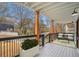 Relaxing front porch with seating area and lush greenery at 490 Third Ave, Scottdale, GA 30079