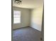 Spacious bedroom with neutral decor and carpet at 435 Price Quarters Rd, Mcdonough, GA 30253