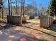 Gravel driveway leading to house with wooden fence at 435 Price Quarters Rd, Mcdonough, GA 30253