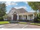 Community clubhouse with a porch and landscaping at 615 Ceremony Way, Acworth, GA 30102