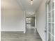 Bright entryway with gray flooring and view to living area at 2594 Hickory Valley Dr, Snellville, GA 30078