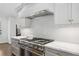 Modern kitchen with stainless steel appliances and white quartz countertops at 436 Valley Brook Ne Dr, Atlanta, GA 30342