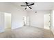 Bright bedroom featuring ample closet space and ceiling fan at 2952 Carrie Farm Nw Rd, Kennesaw, GA 30144