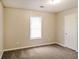 Well-lit bedroom with window and closet at 9343 Haley Ct, Jonesboro, GA 30238
