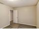 Simple bedroom with neutral decor and carpet at 9343 Haley Ct, Jonesboro, GA 30238