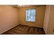 Well-lit bedroom with double door closet and window at 3277 Adelade Ct, Lithonia, GA 30038