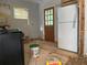 Unfinished kitchen with new flooring and appliances at 1599 Sandtown Sw Rd, Atlanta, GA 30311