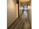 Clean and well-lit hallway with wood-look floors at 870 Mayson Turner Nw Rd # 1110, Atlanta, GA 30314