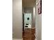 Hardwood floor hallway with bathroom access at 870 Mayson Turner Nw Rd # 1110, Atlanta, GA 30314
