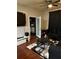 Living room with access to a balcony and hardwood floors at 870 Mayson Turner Nw Rd # 1110, Atlanta, GA 30314