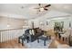 Open living room and dining area with hardwood floors at 1200 Golden Valley Ct, Lawrenceville, GA 30043