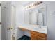 Clean bathroom with vanity and adjacent toilet at 3362 Eastmont Ln, Lithonia, GA 30038