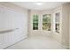 Cozy bedroom with double door closet and a bay window at 3362 Eastmont Ln, Lithonia, GA 30038