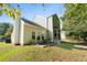 Rear view of house showcasing a patio and private backyard at 3362 Eastmont Ln, Lithonia, GA 30038