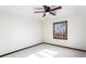 Bright bedroom with wood-framed window, ceiling fan, and neutral carpeting at 2085 Cactus Ln, Cumming, GA 30040