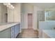 Elegant bathroom with granite countertops, a soaking tub, and a walk-in shower at 4537 Ajo Walk, Atlanta, GA 30331