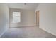 Bedroom with carpet, window and door to bathroom at 4537 Ajo Walk, Atlanta, GA 30331