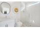 Modern bathroom with white tile, glass shower, and hexagon floor tile at 90 Cleveland Se St # A, Atlanta, GA 30316