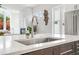 Modern kitchen sink and faucet with white quartz countertops at 90 Cleveland Se St # A, Atlanta, GA 30316