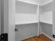 Bright white pantry with ample shelving for storage at 90 Cleveland Se St # A, Atlanta, GA 30316