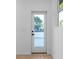 Modern white door leading to a backyard patio with treetop views at 90 Cleveland Se St # B, Atlanta, GA 30316