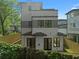 Rear view of a modern home featuring a gray and white exterior at 90 Cleveland Se St # B, Atlanta, GA 30316